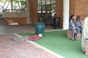 A sculpture depicts a man passed out from drinking too much alcohol. Photo by Cody Boteler.